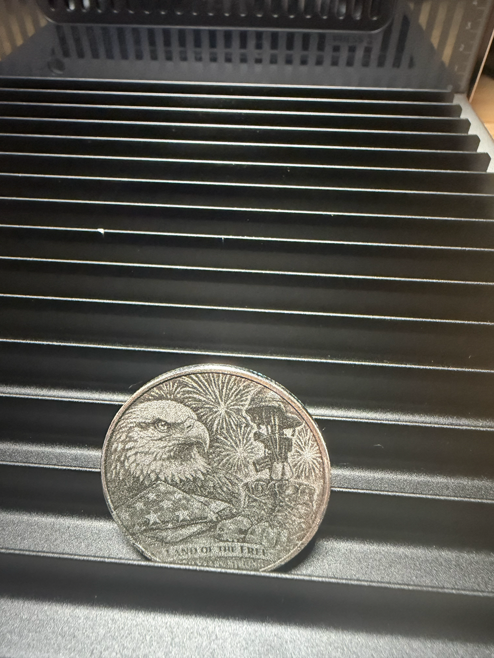  Hand laser-engraved 40mm alloy coin featuring a bald eagle and patriotic design. Made in-house with precision. Perfect collectible or gift